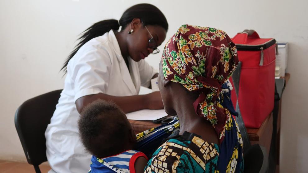 Mother and baby at a consultation, by the Global Health EDCTP3-funded PROTECT project