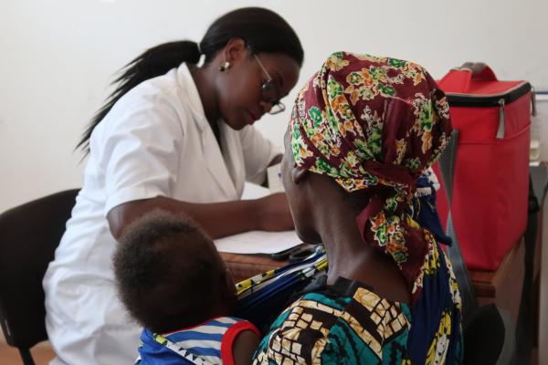 Mother and baby at a consultation, by the Global Health EDCTP3-funded PROTECT project